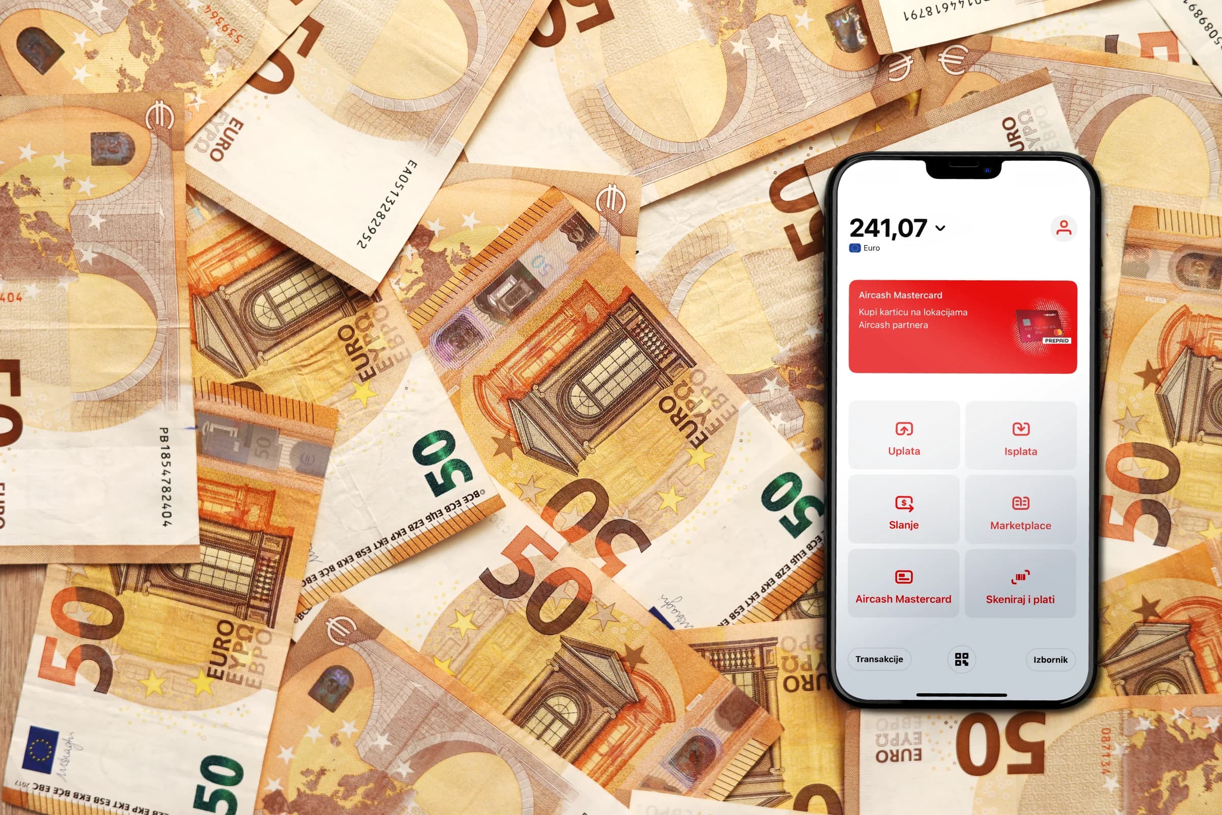 Smartphone displaying a banking app with a balance of 241.07 on a background of scattered 50 euro banknotes.